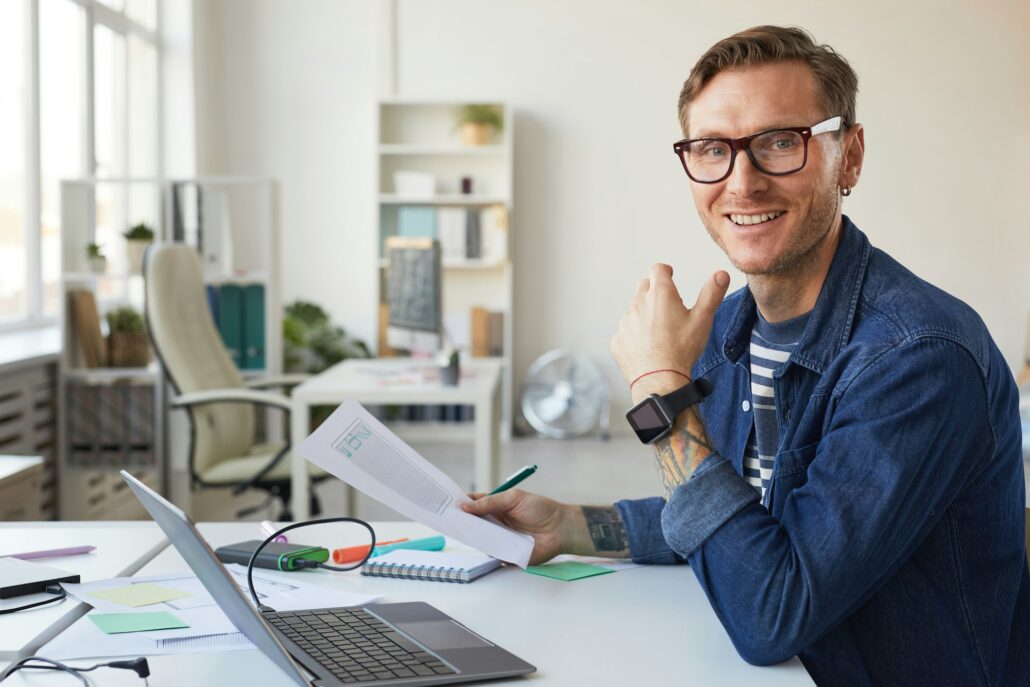 Smiling IT Developer Designing Web Applications